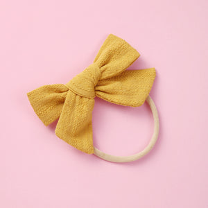 Mustard linen bow